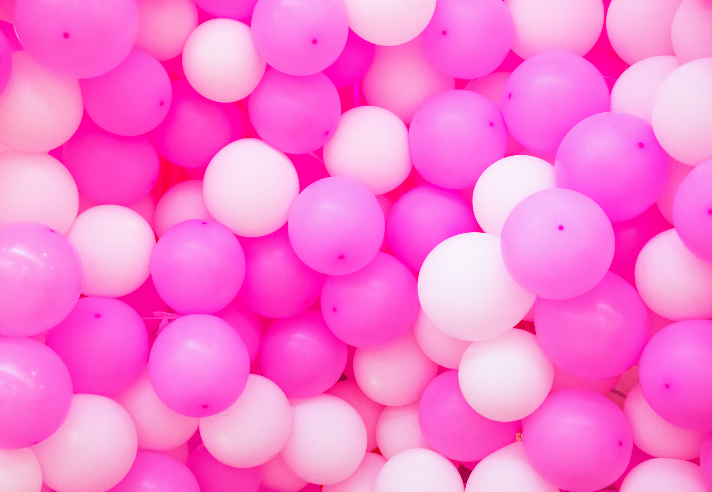 Air balloons background. Pink airballoons texture. Girl birthday or romantic wedding photo backdrop.