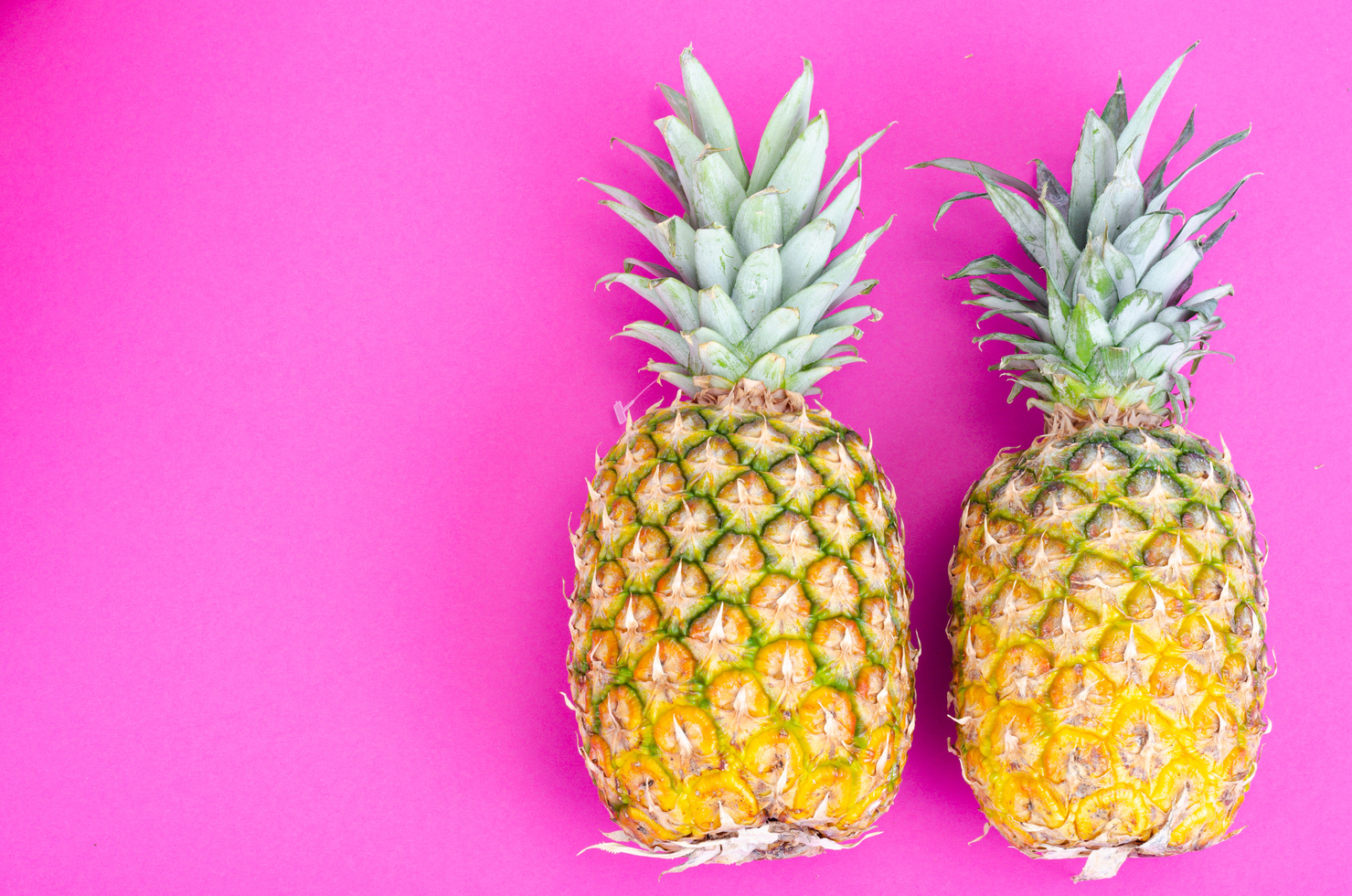 Whole Pineapple Fruit on Bright Background. Photo