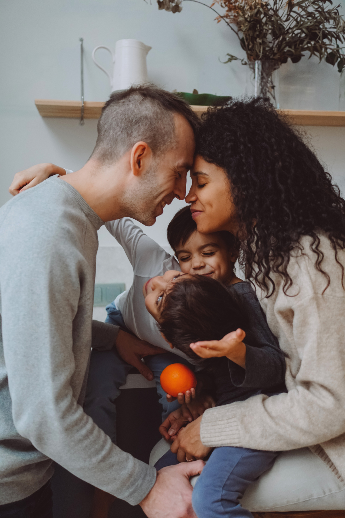 Family of Four Playing Spending Time Together at Home