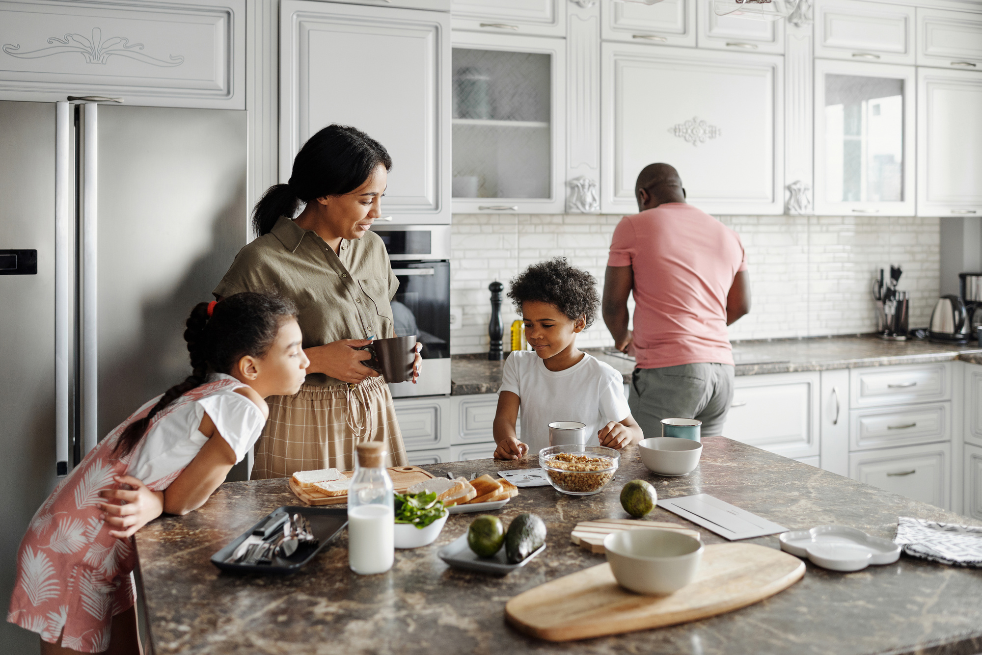 Family Making Breakfast in the Kitchen