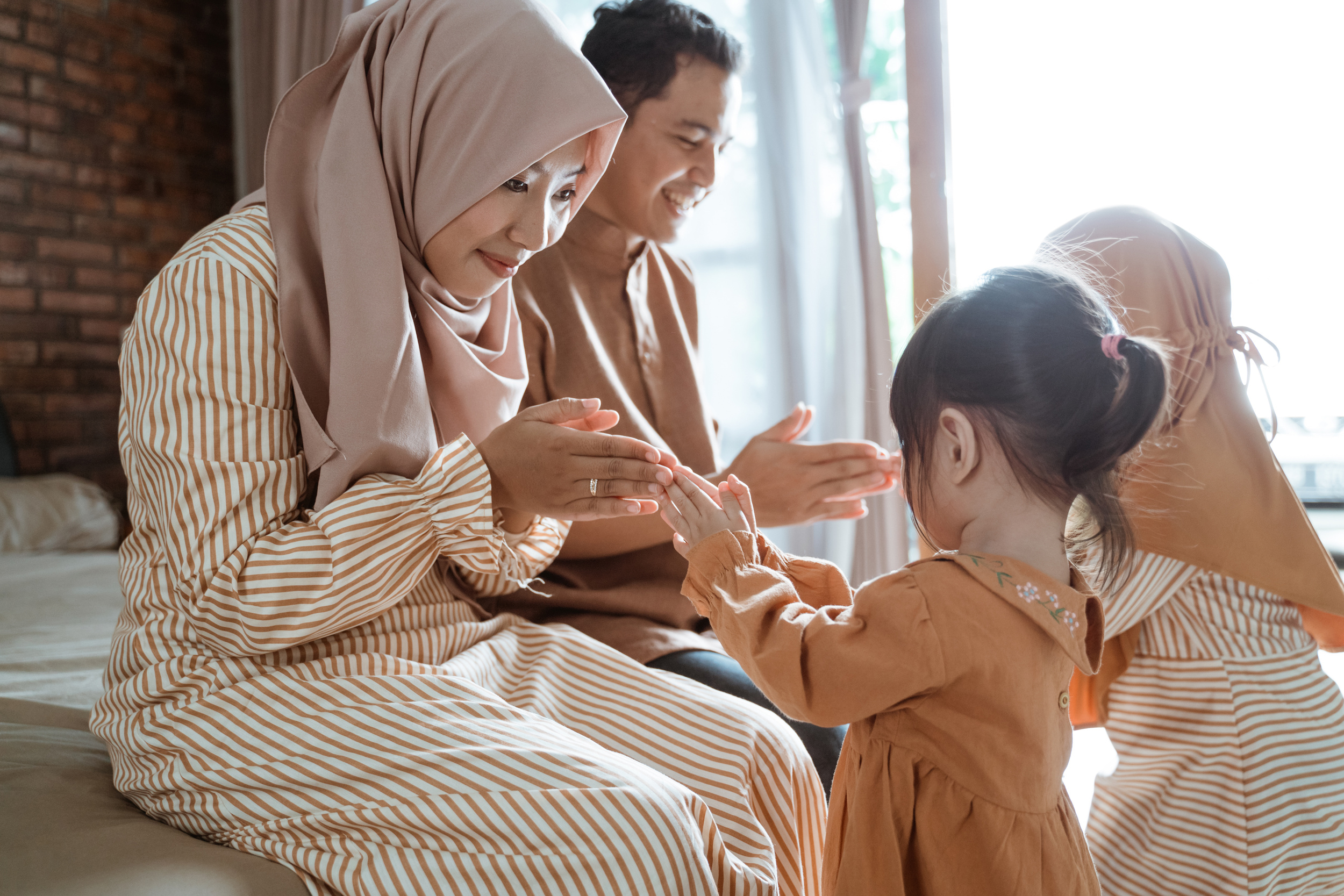 Parents Playing with Children