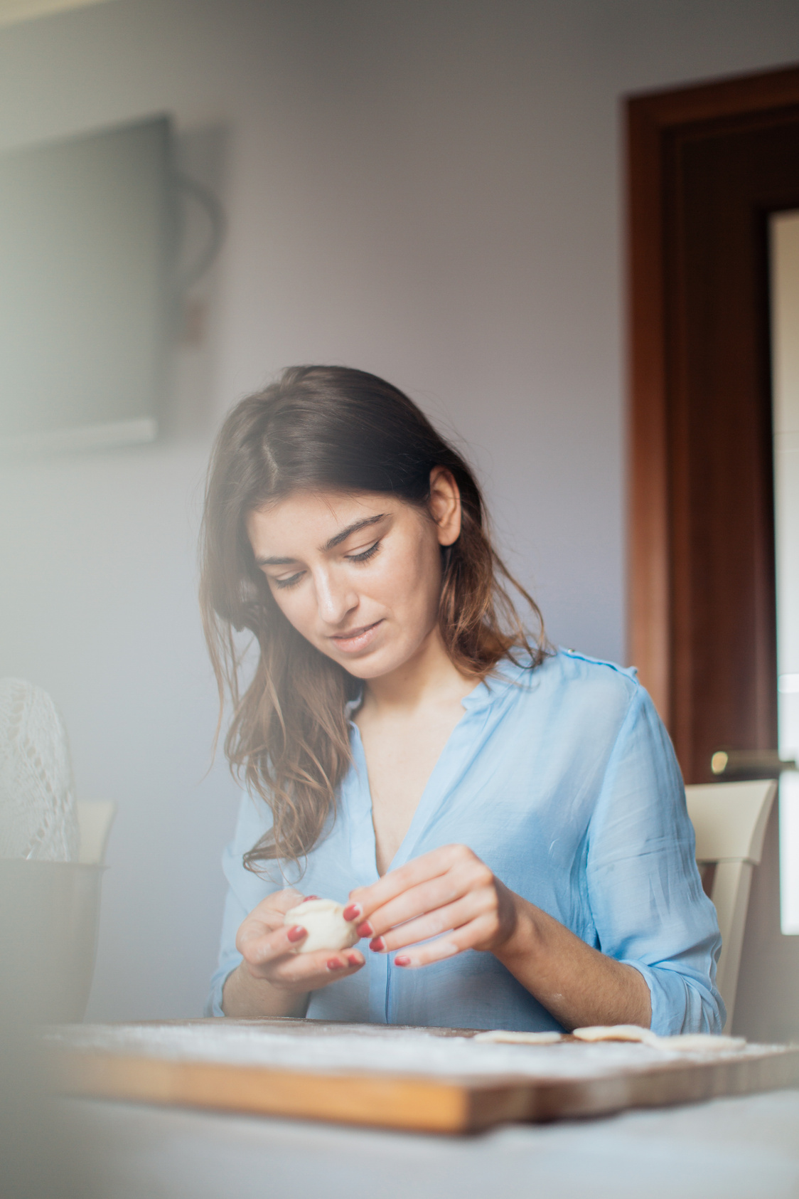 Photo Of Woman Holding Dough