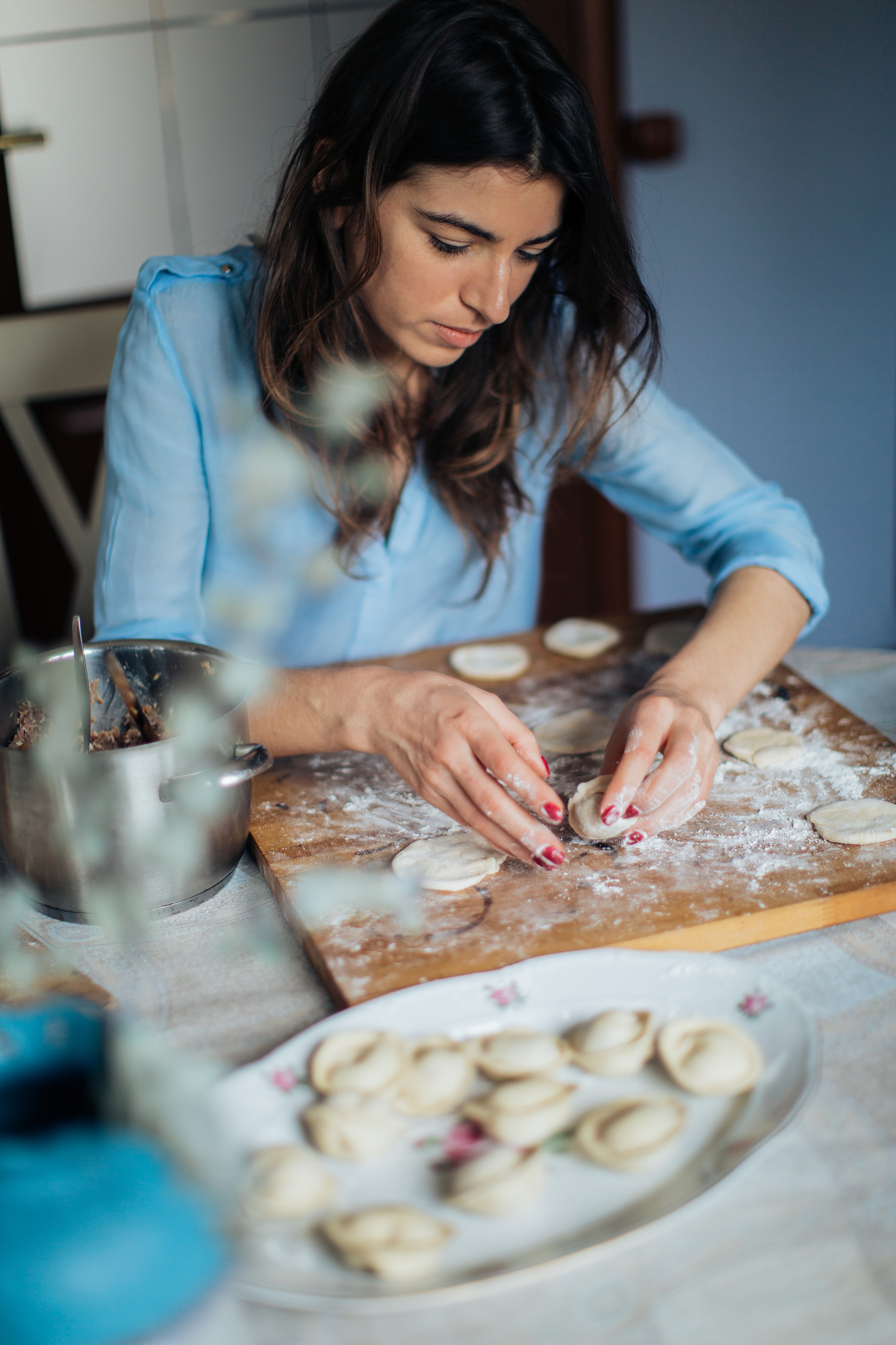 Photo Of Woman Holding White Pastry